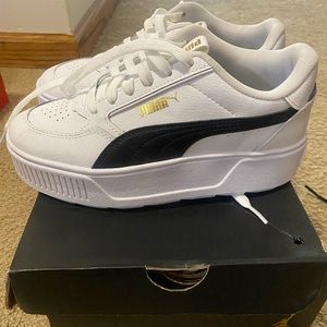 Brand new girls puma platform sneakers. White and black with gold accents
